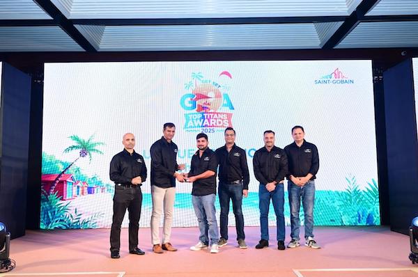 Award distribution at Top Titans Success Meet 2025