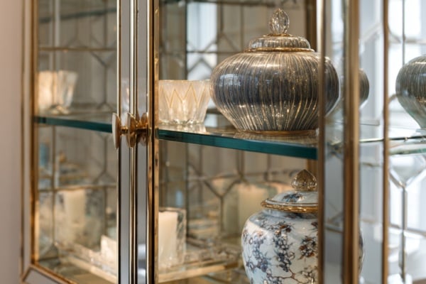 Bevelled mirrors and glass shelving