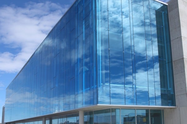 Blue solar control glass reduces heat and glare