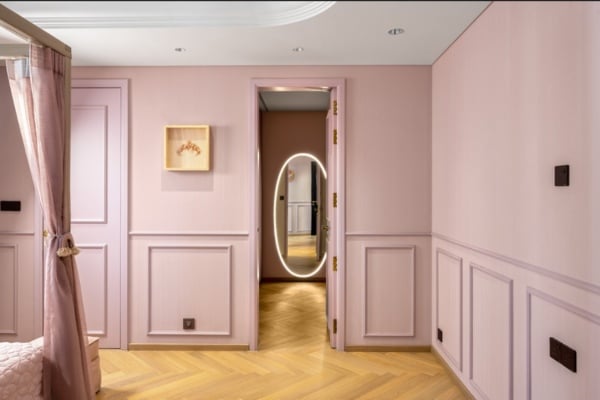 Elegant Oval LED Mirrors in Walk-In Closet. 