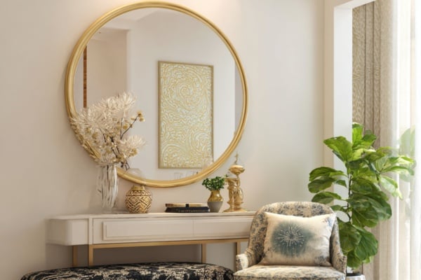 Round mirrors above consoles create a soft focal point