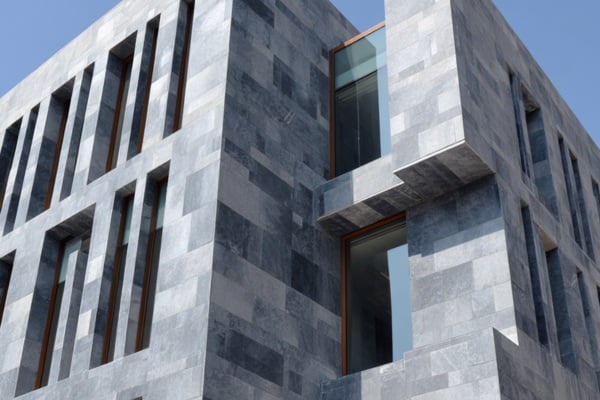 Solid Facades Shape Timeless, Sculptural Silhouettes